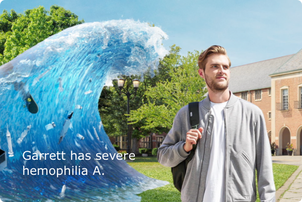 Garrett standing next to a wave