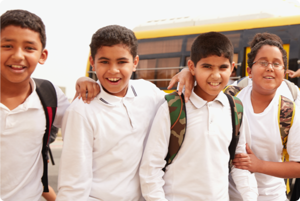 Four students smiling