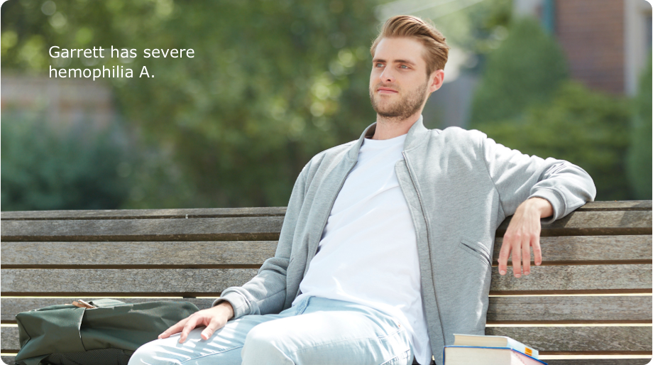 Garrett, who has severe hemophilia A, relaxing on a wooden bench